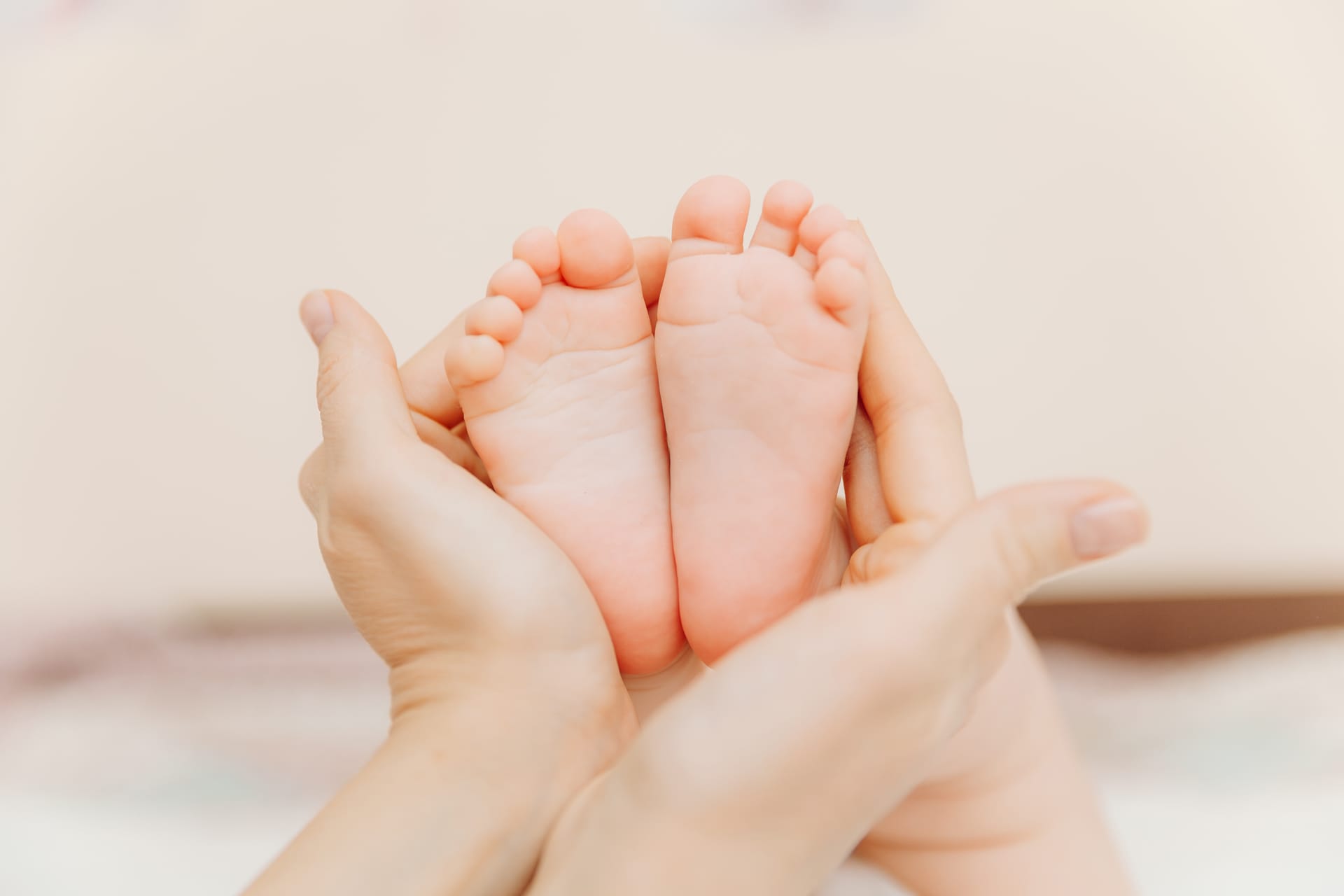 Mom her child happy family concept baby feet excellent picture