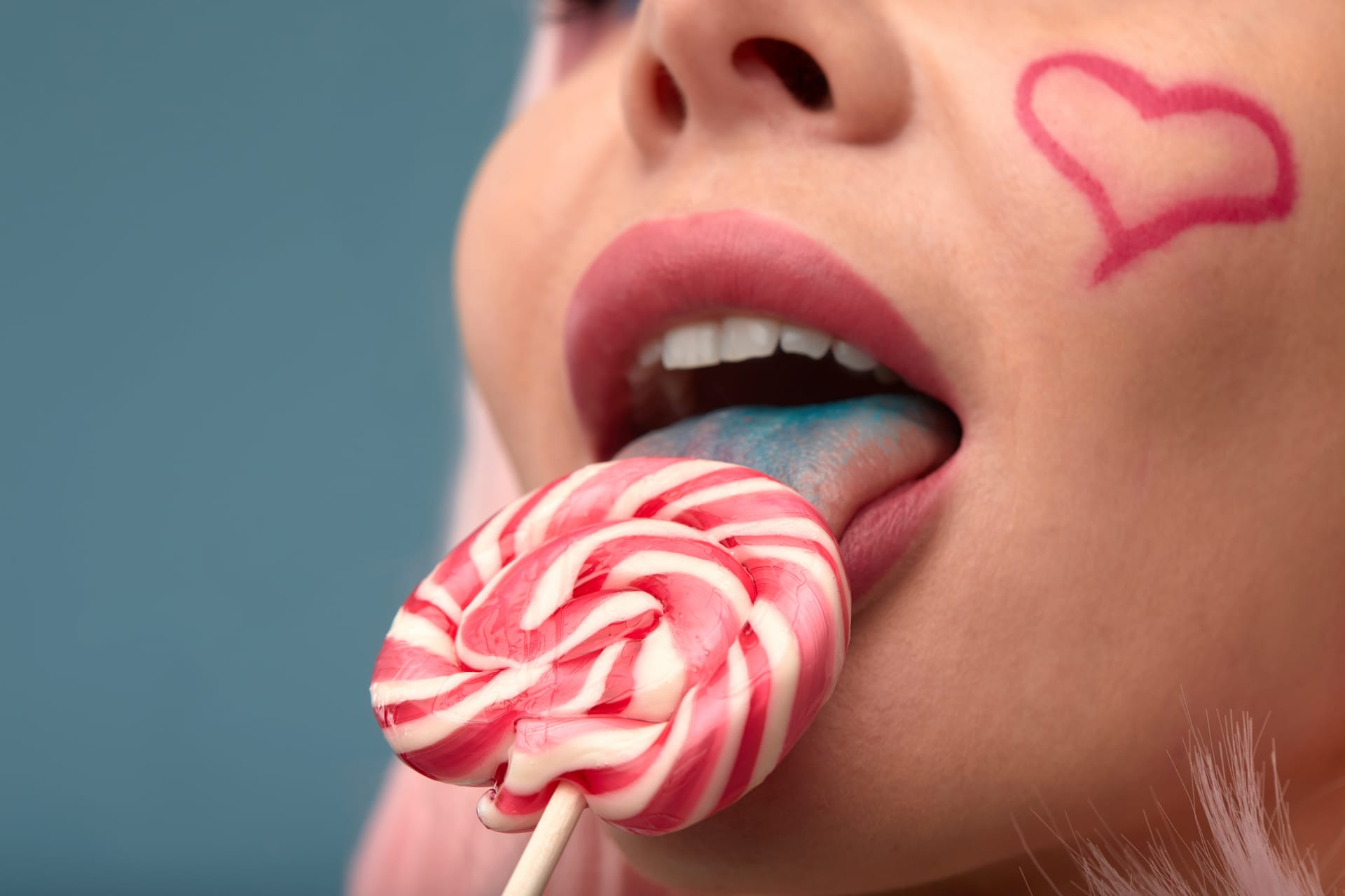 With candy mouth pretty glamorous woman pink hair charm sweets lifestyle enjoyment sugar