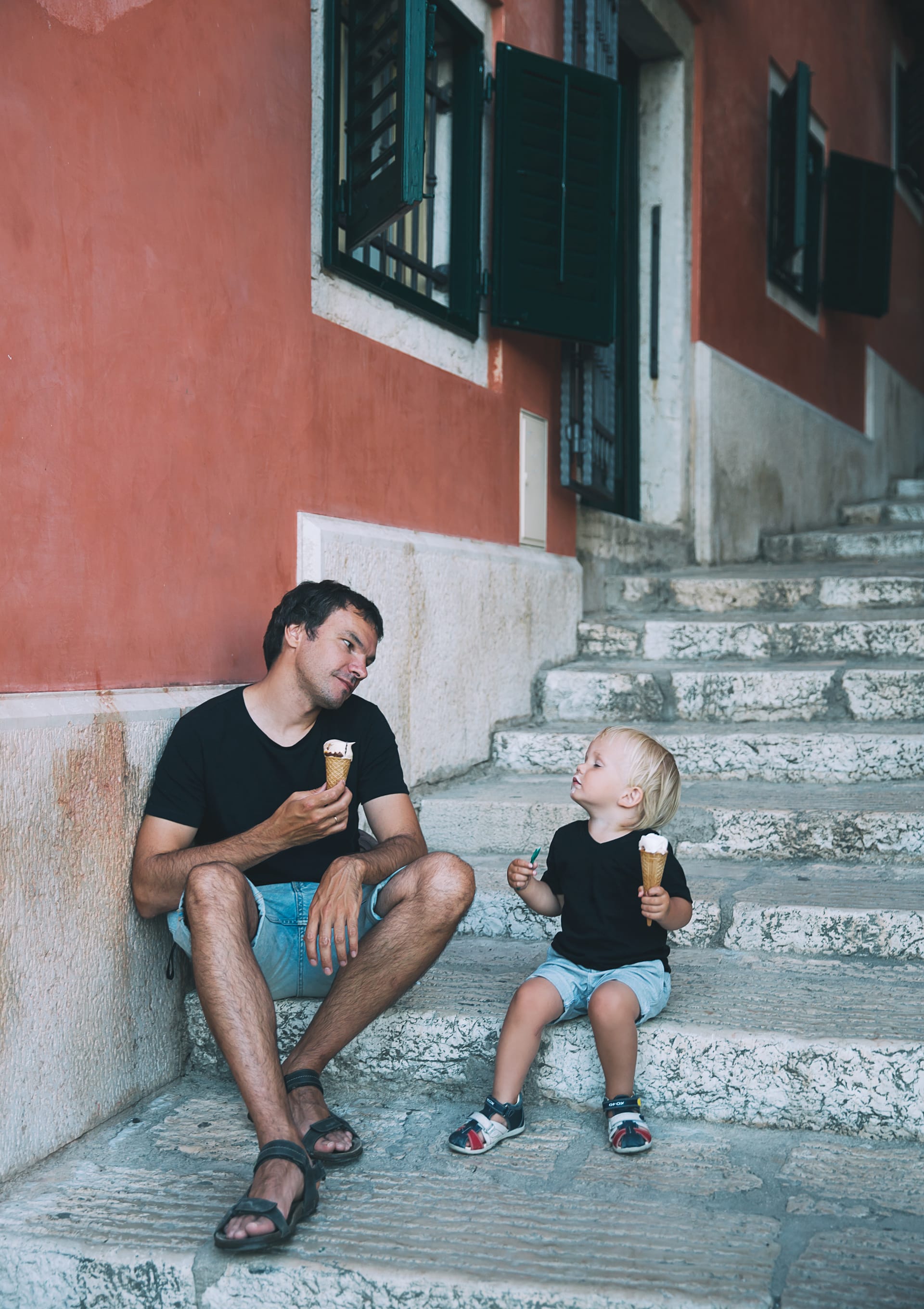 Boy with gelato old street italy loving family summer vacation
