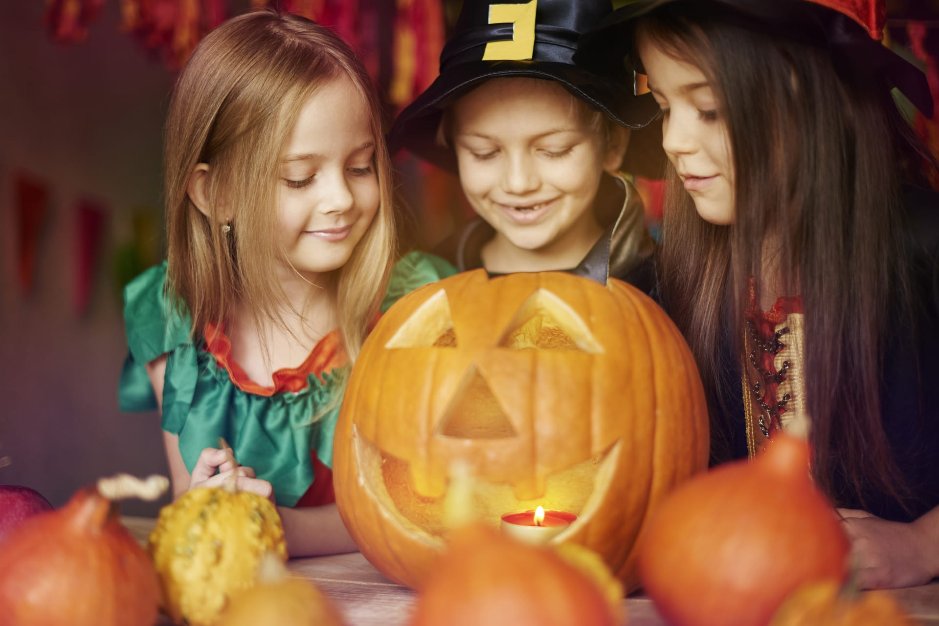 Boy and sisters have fun celebrating halloween