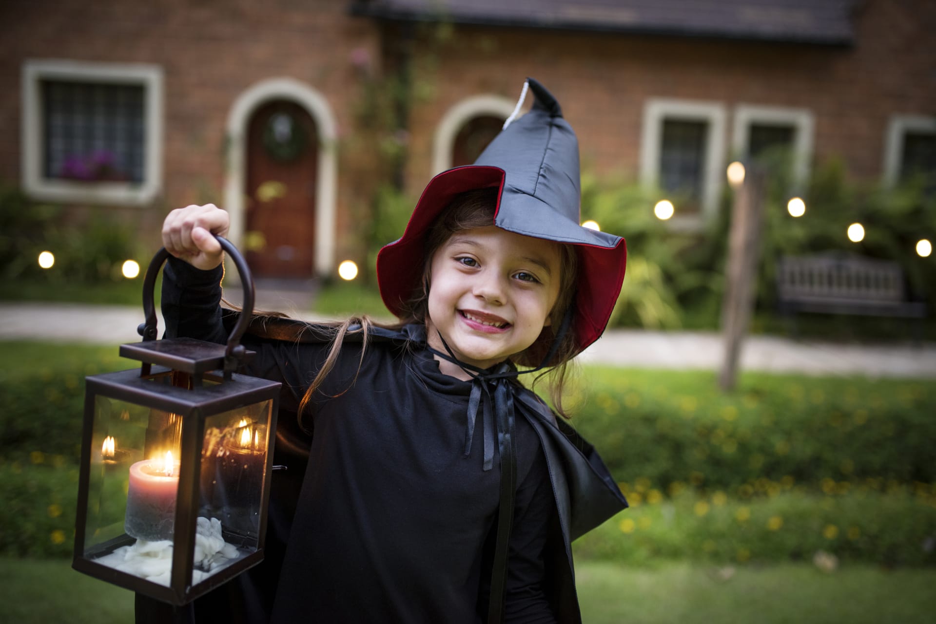 Little girl dressed up as witch