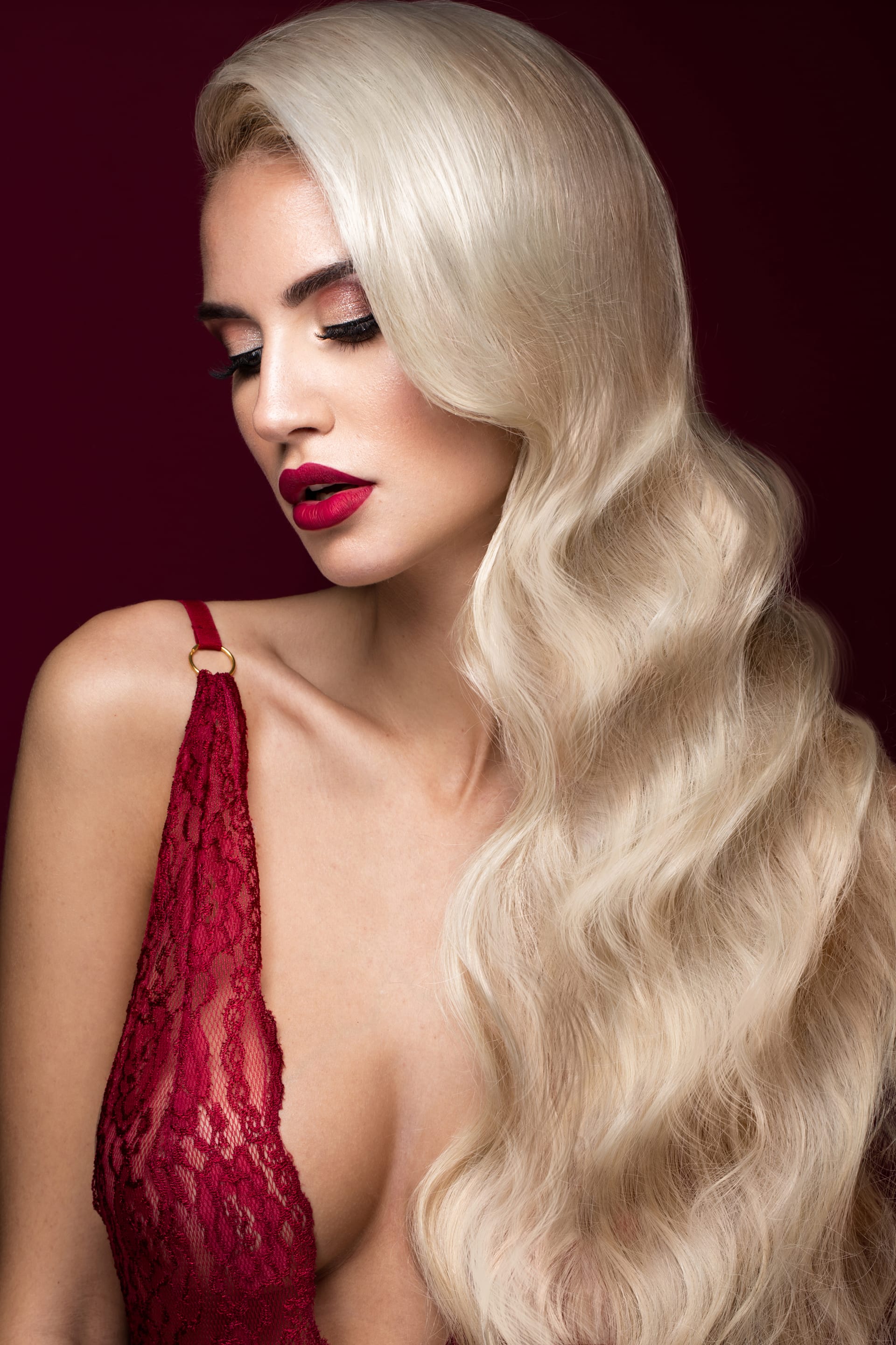 Hollywood manner with curls red lips lingerie beauty face hair
