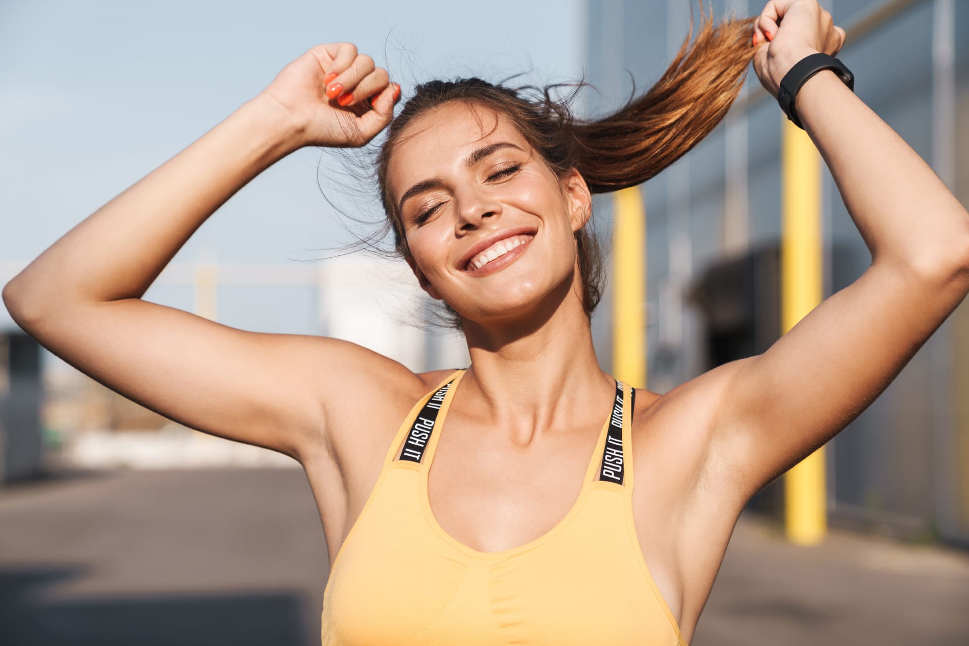 Image happy woman sportswear smiling walking outdoors sunny morning