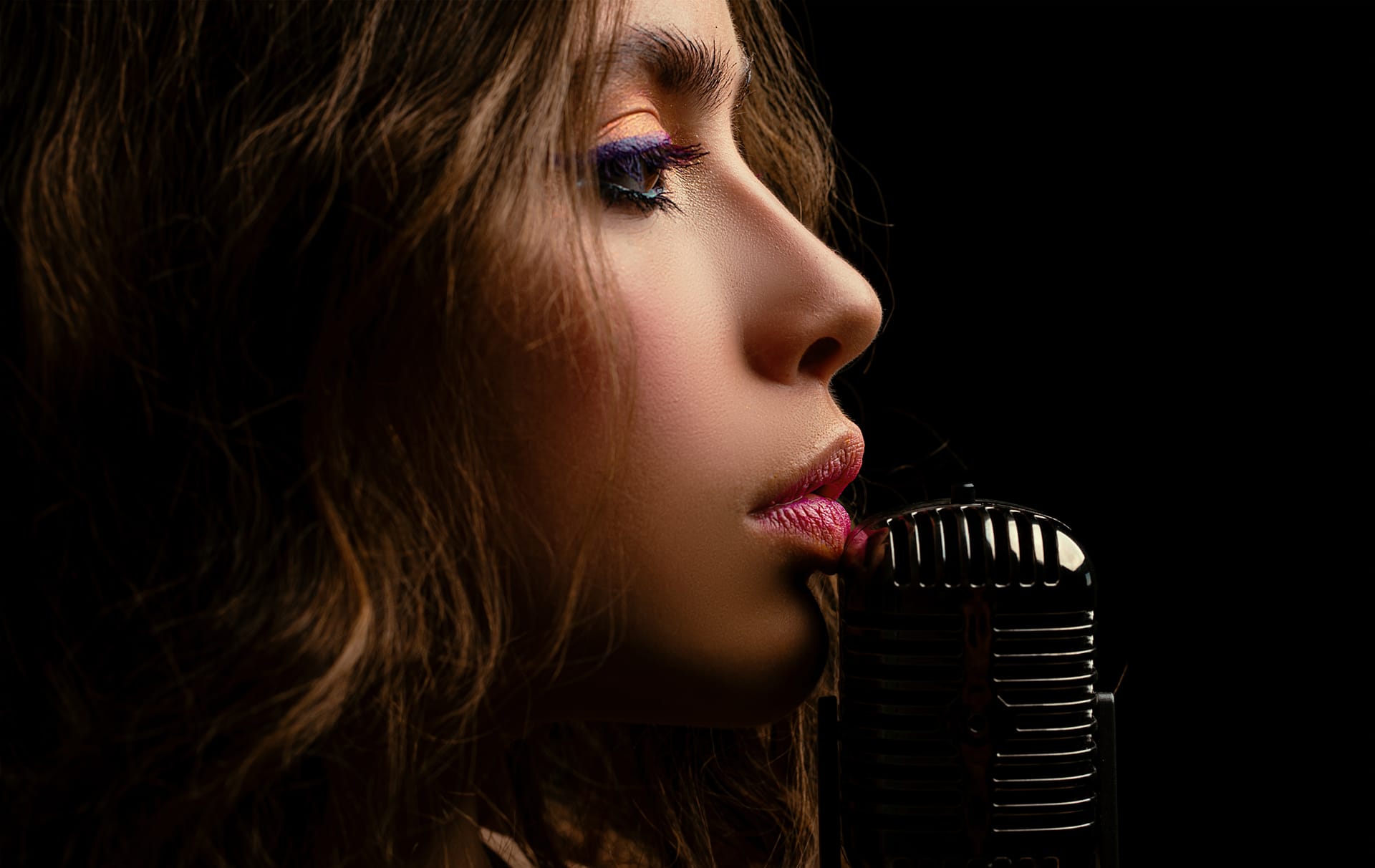Closeup woman with retro microphone karaoke girl singer concert sing