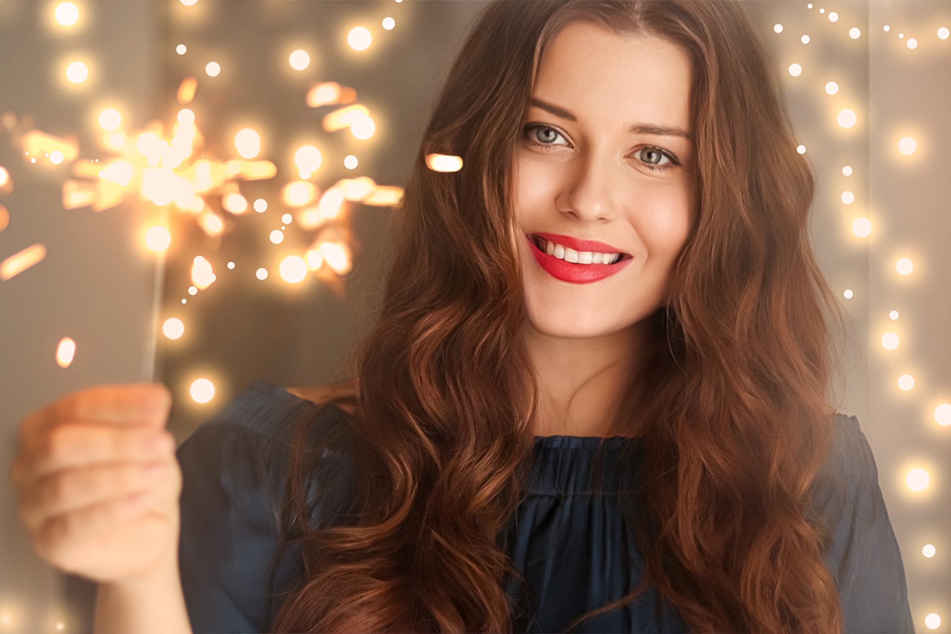 Holiday magic christmas new year celebration happy woman with sparklers