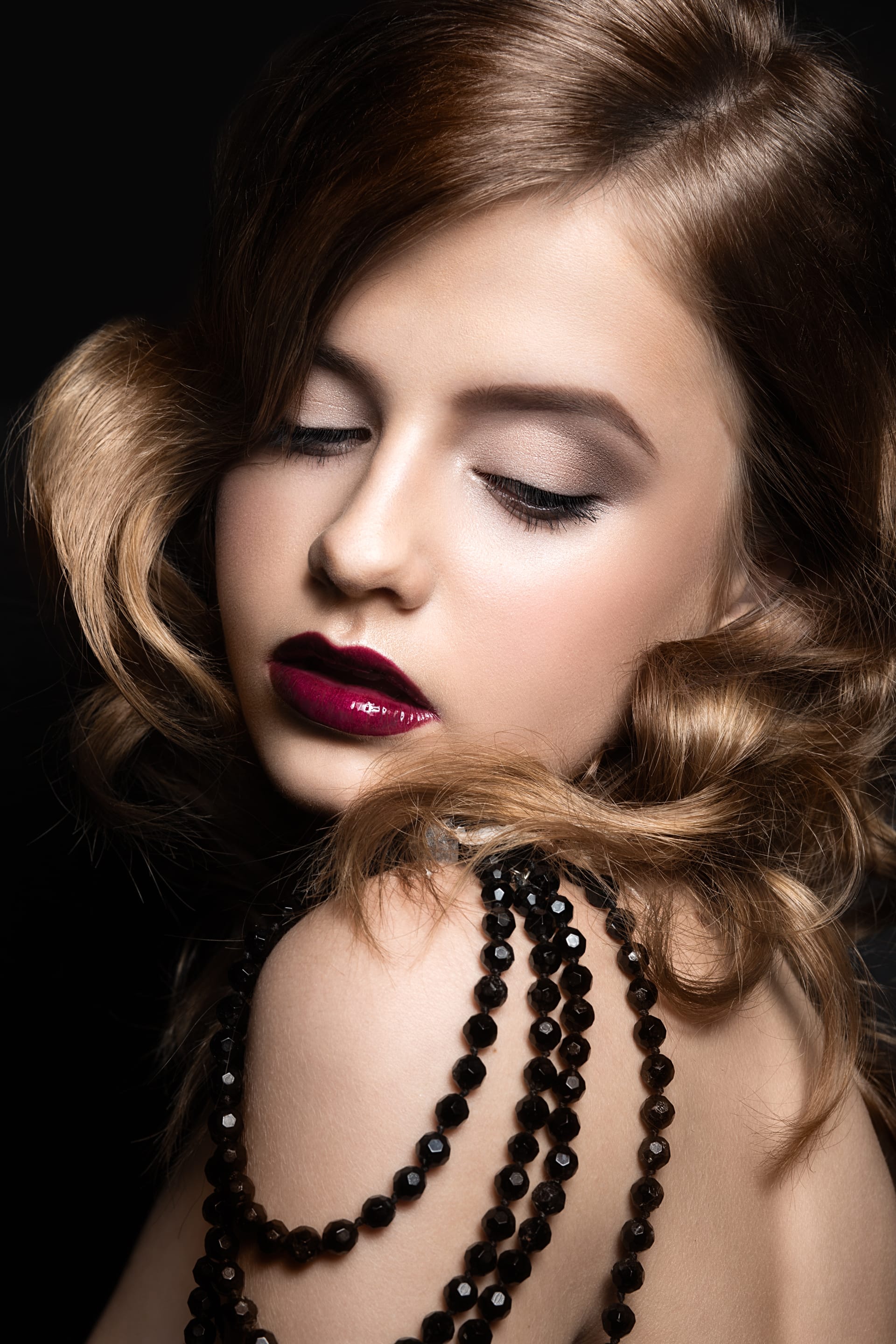 Woman with evening make up red lips curls image