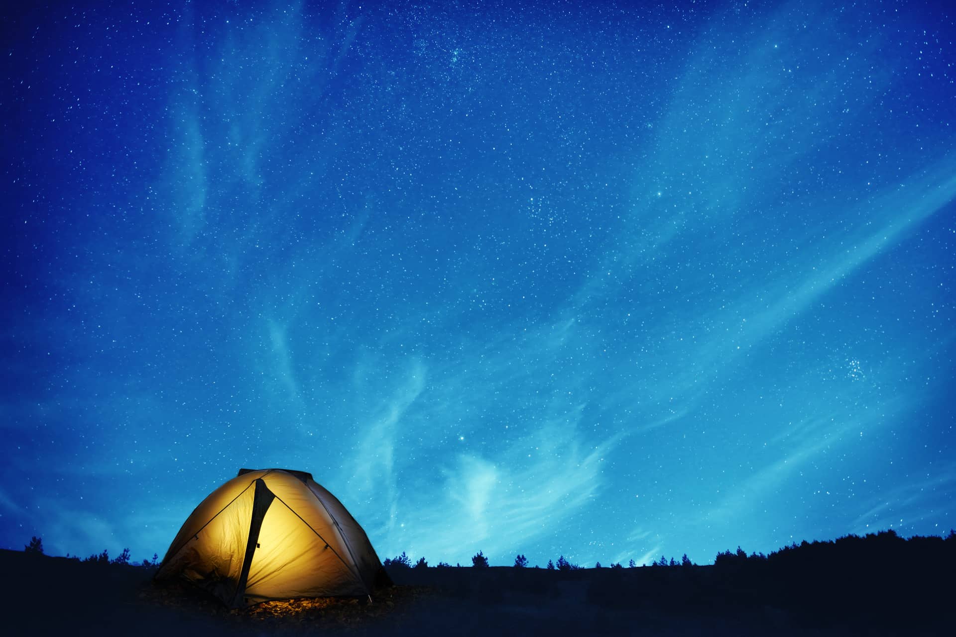 Illuminated yellow camping tent many stars night blue profile picture
