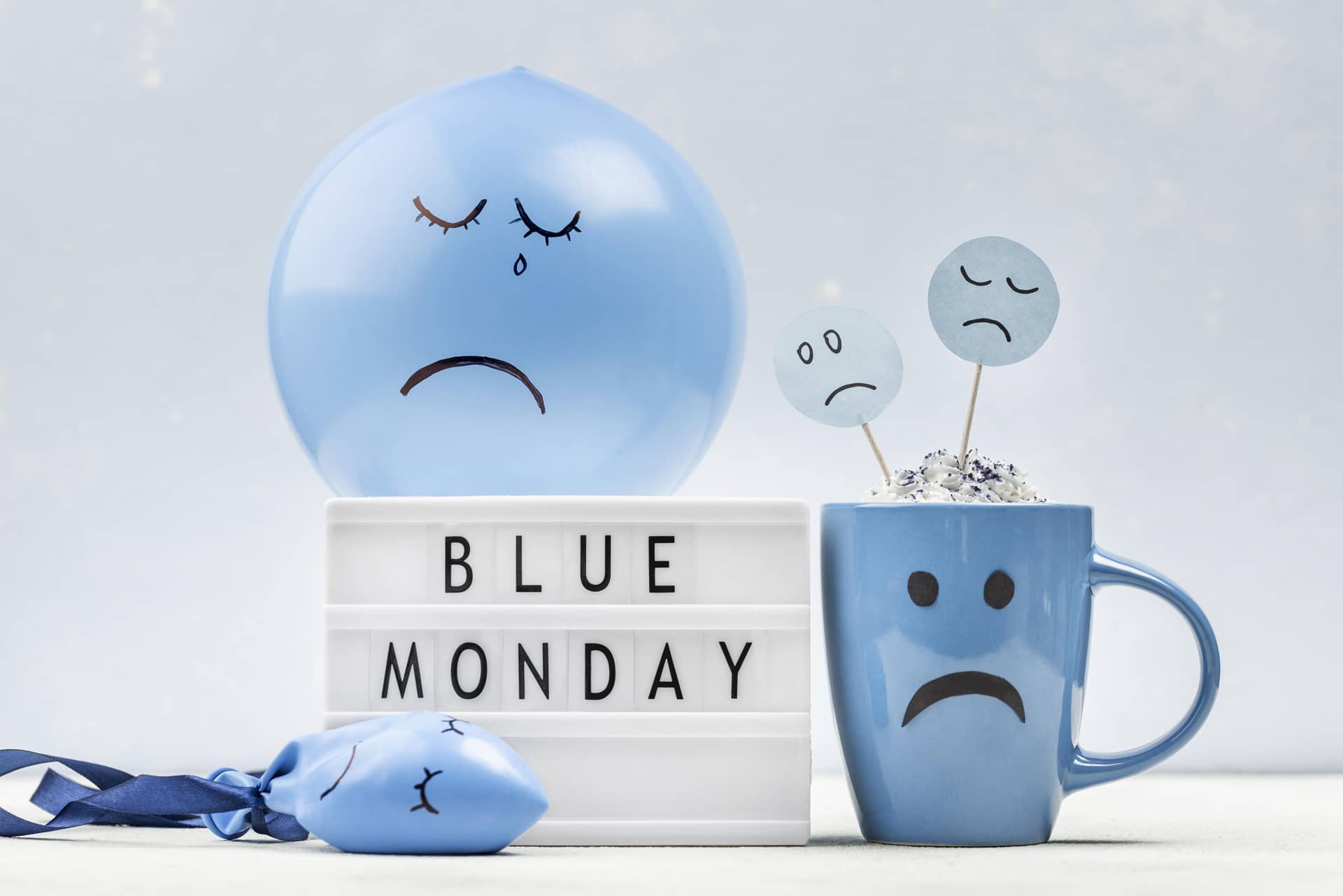 Sad balloon mug with light box blue monday