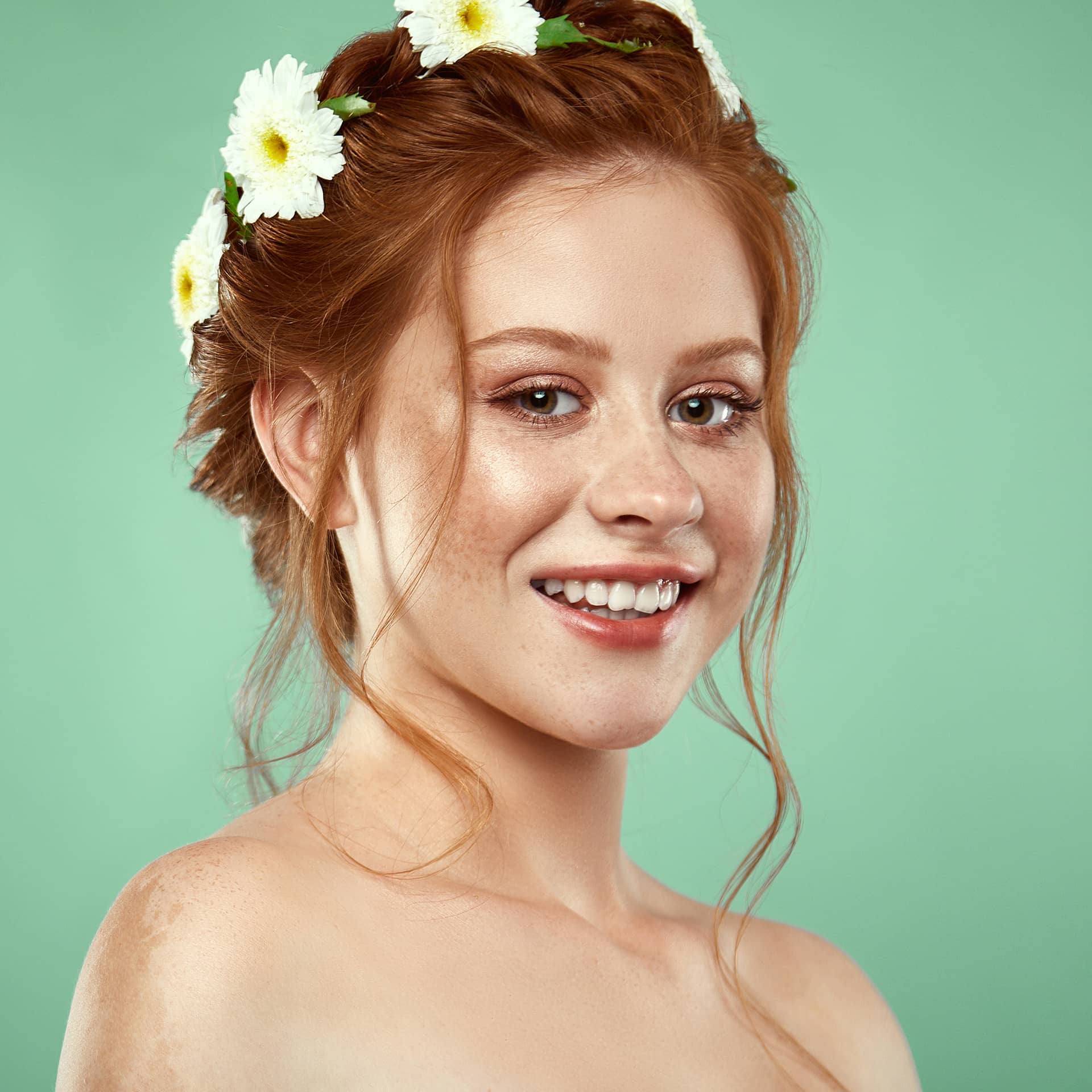 Female profile picture beautiful positive redheaded girl with chamomile crown her head