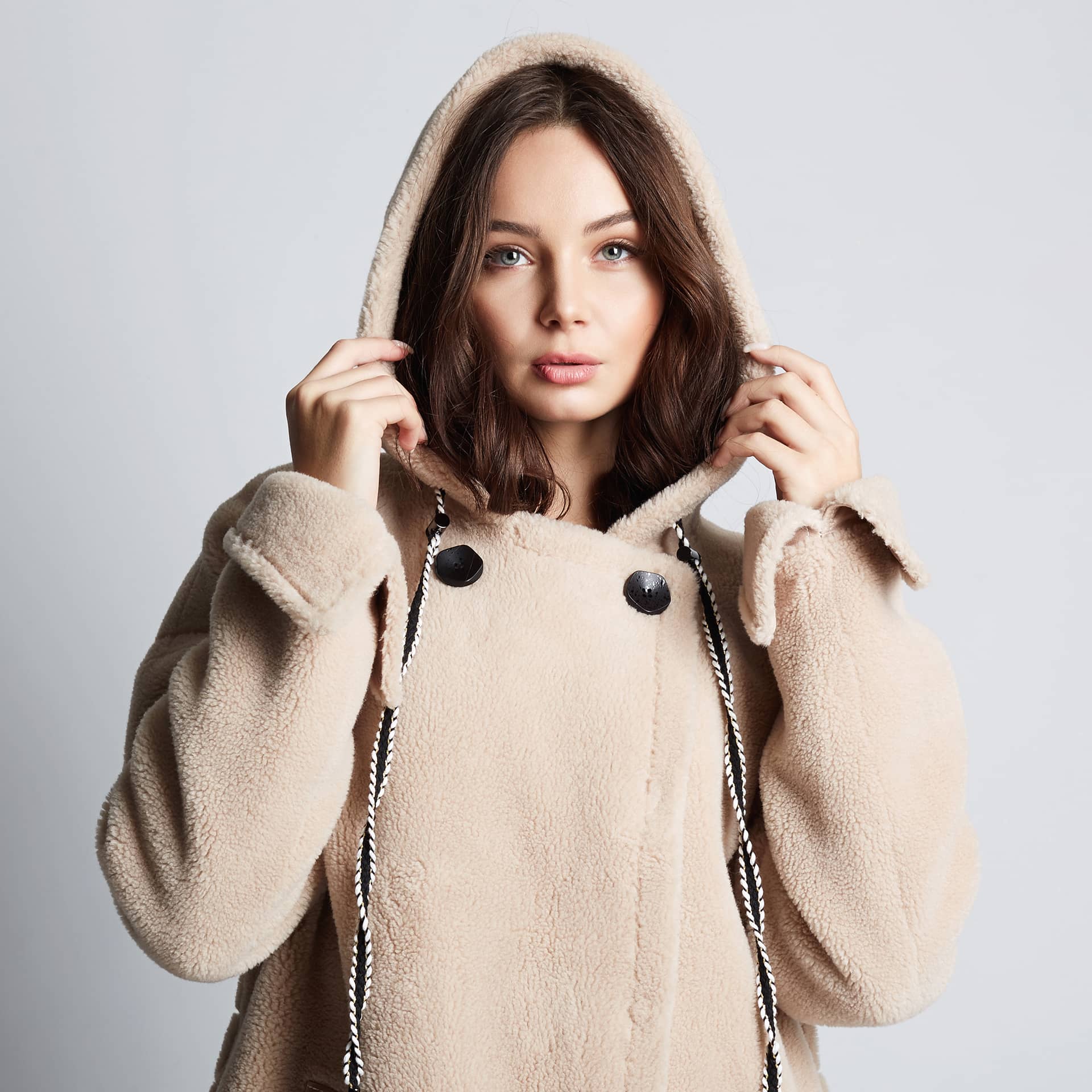 Beauty young woman wearing fur hood beautiful girl hoodie coat