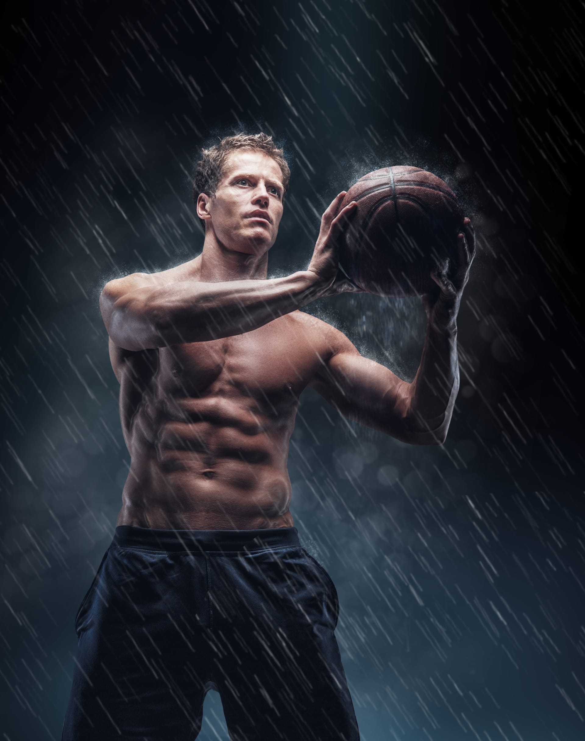 Artistic portrait shirtless wet bascetball player droplets excellent image