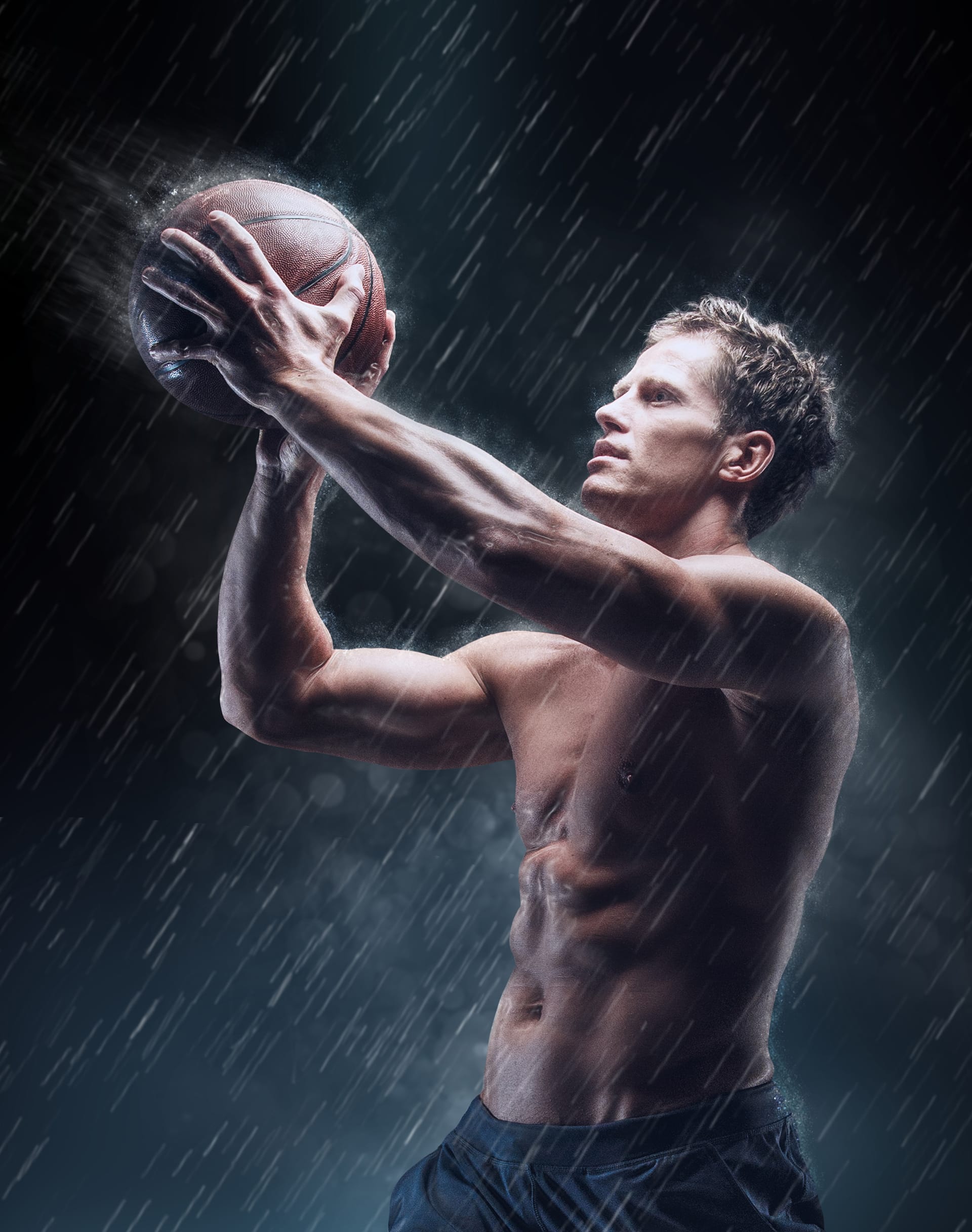 Artistic portrait shirtless wet bascetball player droplets picture