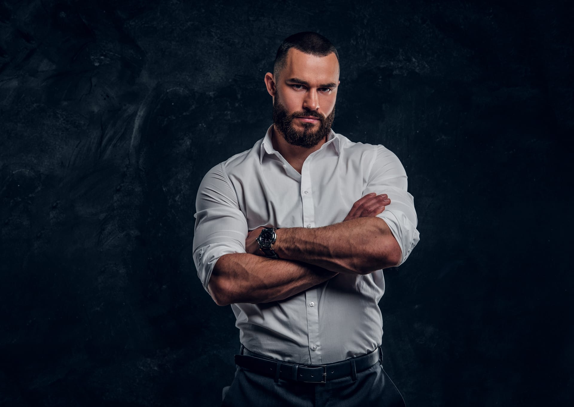 Sucessful bearded businessman white shirt is posing