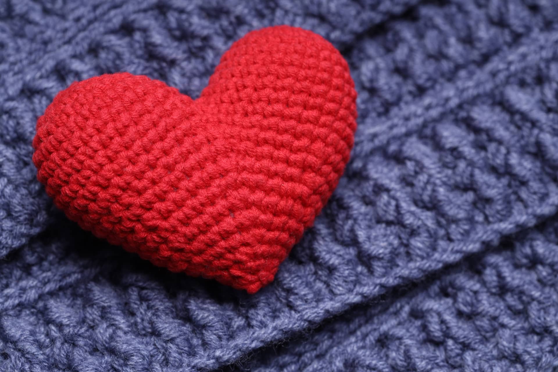Heart lies blue knitted napkin love concept high quality photo