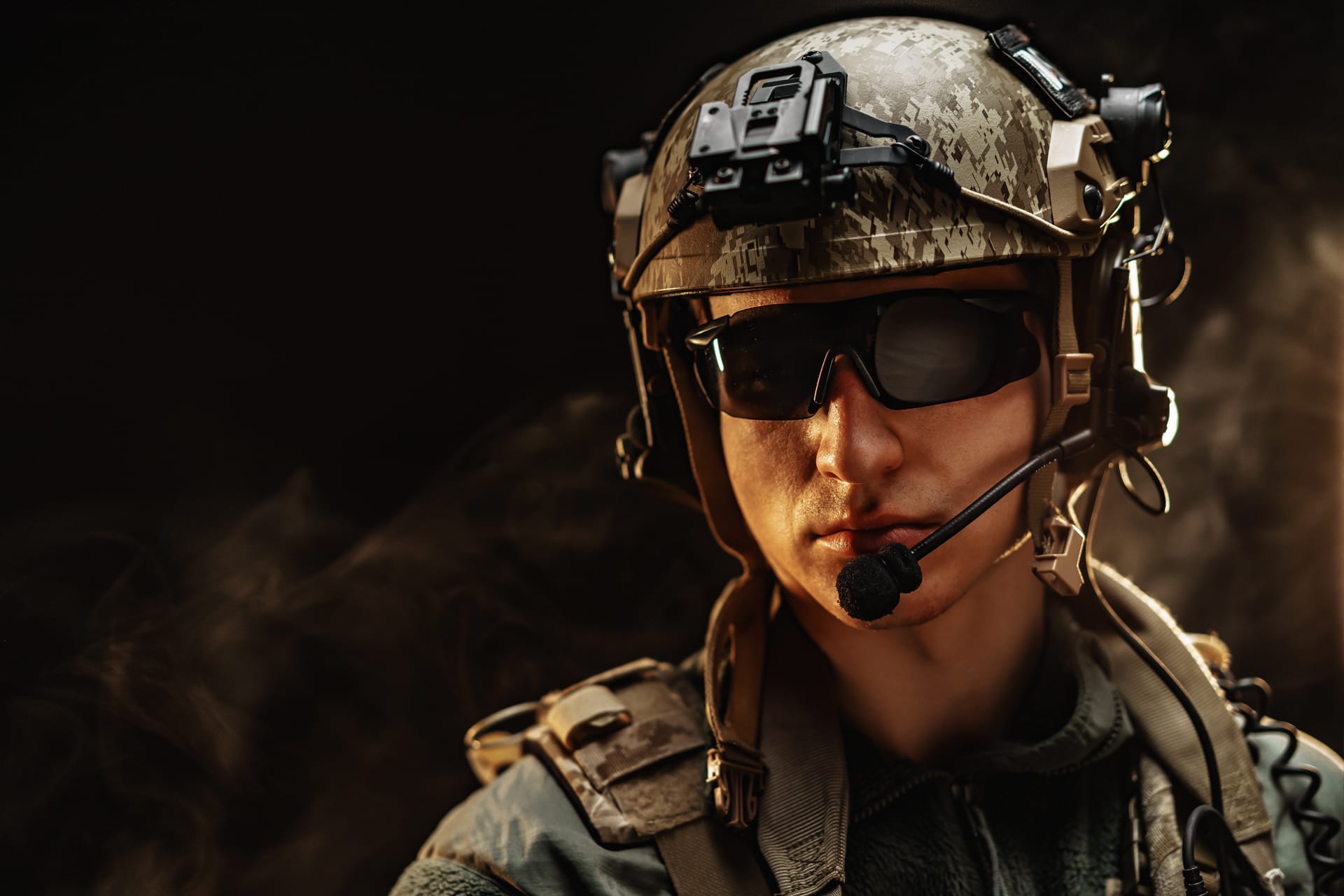 Portrait special forces soldier helmet glasses dark