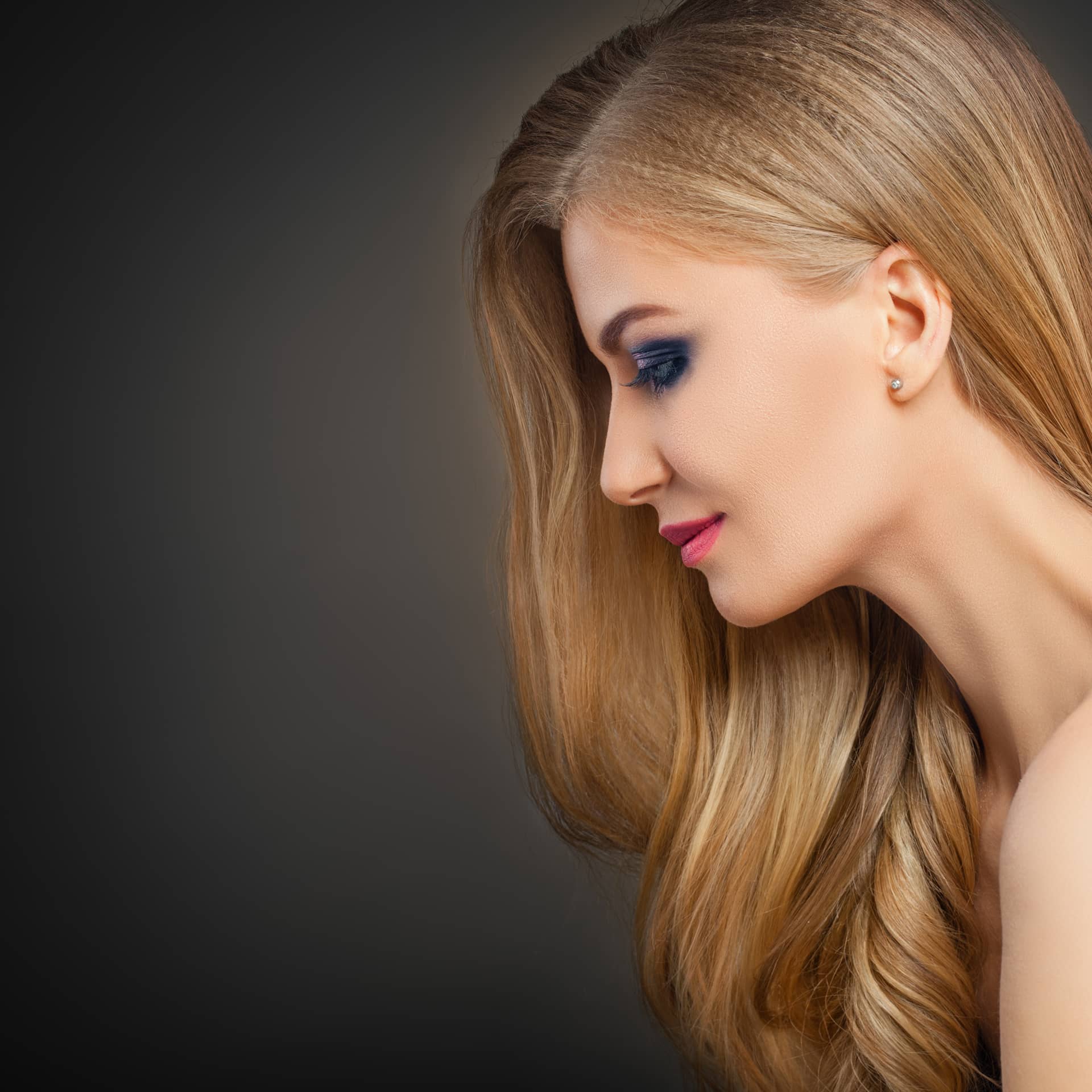Profile photo with long blonde hair makeup fashion portrait beautiful model girl