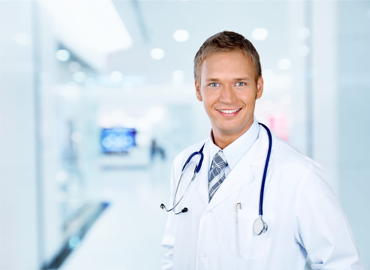 Related image portrait happy doctor with stethoscope looking camera
