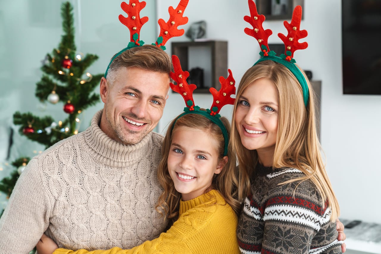 Related image caucasian happy family christmas reindeer antlers celebrating holiday home with new year tree