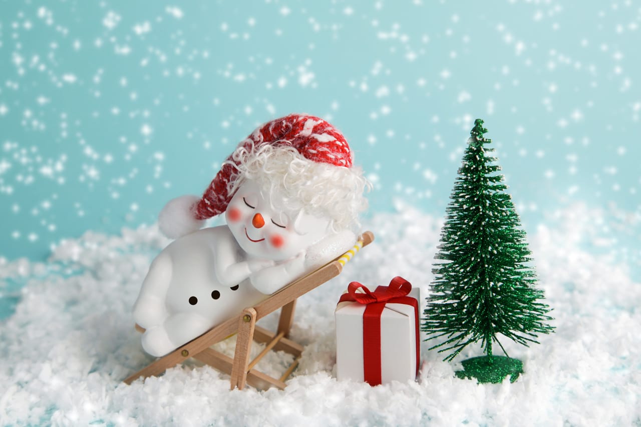 Related image snowman is relaxing sun lounger christmas eve noel time relax snowman christmas tree gift box blue background winter