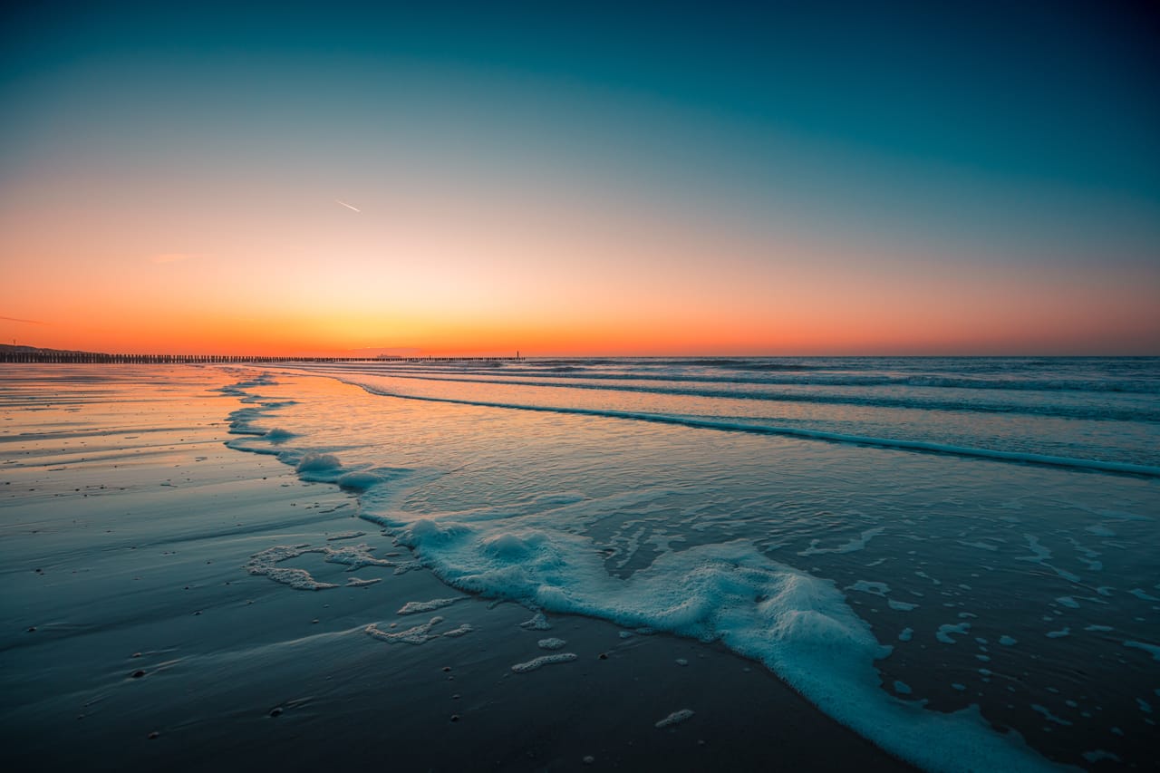 Related image beautiful view foamy waves beach sunset captured domburg netherlands